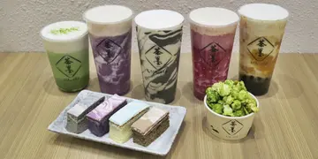 尖咀新开本地茶饮店   水墨画风芝麻乌龙麻糬鲜奶