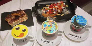 尖咀新开艺术咖啡馆     梵高星夜+村上隆太阳花通通饮得  兼可打印个人专属咖啡
