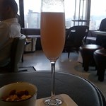 a mixture of Prosecco sparkling wine and peach purée