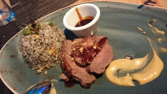 Wagyu beef rump steak with black truffle fried rice