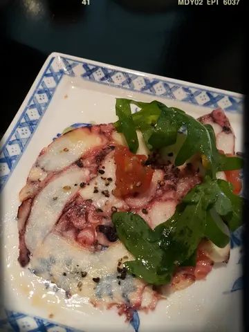 Octopus Carpaccio w/ Roasted Pepper & Olive Oil