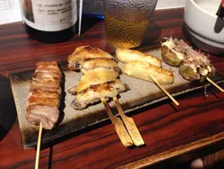 左起: 五花肉、雞中翼、芝士魚蛋、八爪魚丸