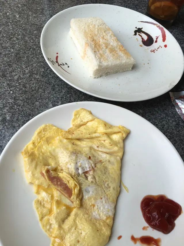 免費包烘底，餐牌無寫的。