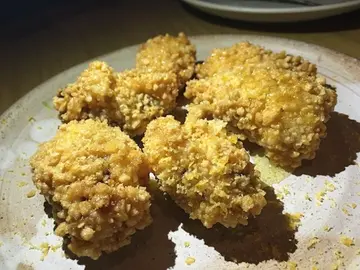 Mantis shrimp popcorn with cured duck yolk