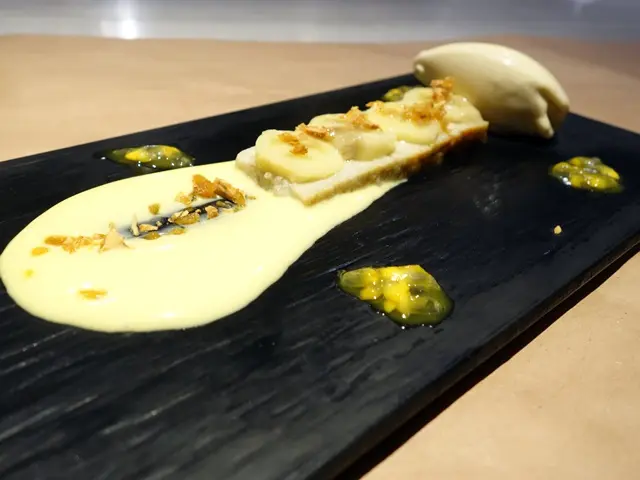 Banana's ice cream & pudding with passionfruit cream and crispy peanut