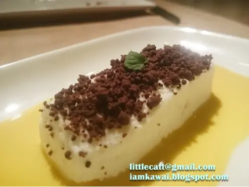 Coconut and Ginger mousse with mango cream and cocoa soil.