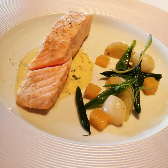 Poached Scottish salmon, dill weed sauce, seasonal vegetables
