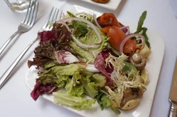 Mixed greens at weekday antipasti buffet