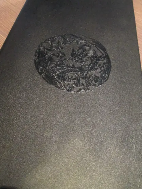 讓老爸細閱餐簿