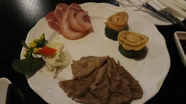 冰鎮鮑魚好細隻，半隻手指咁細