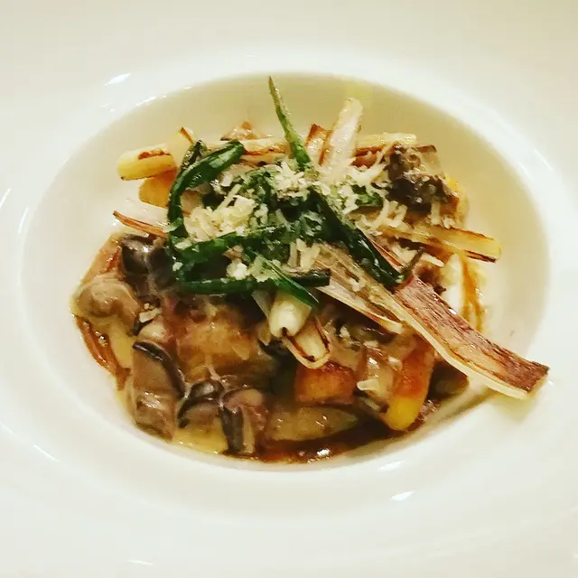 Sauteed potato gnocchi with caramelized leek, cep vinaigrette and shiitake duxelle.