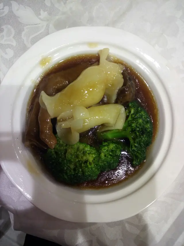 鵝掌扒西蘭花一般。