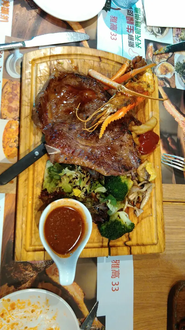 美國特級斧頭扒16安士配蒜香大頭蝦半隻