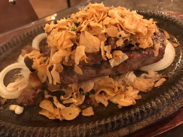 熱板烤MFG招牌肉眼扒配蒜頭山