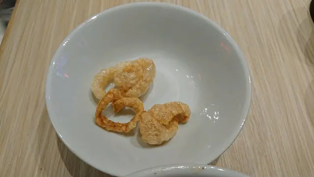 要開聲問2次先比番原本應有嘅炸豬皮