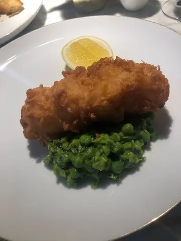 Battered Cod, chips and minted mushy peas