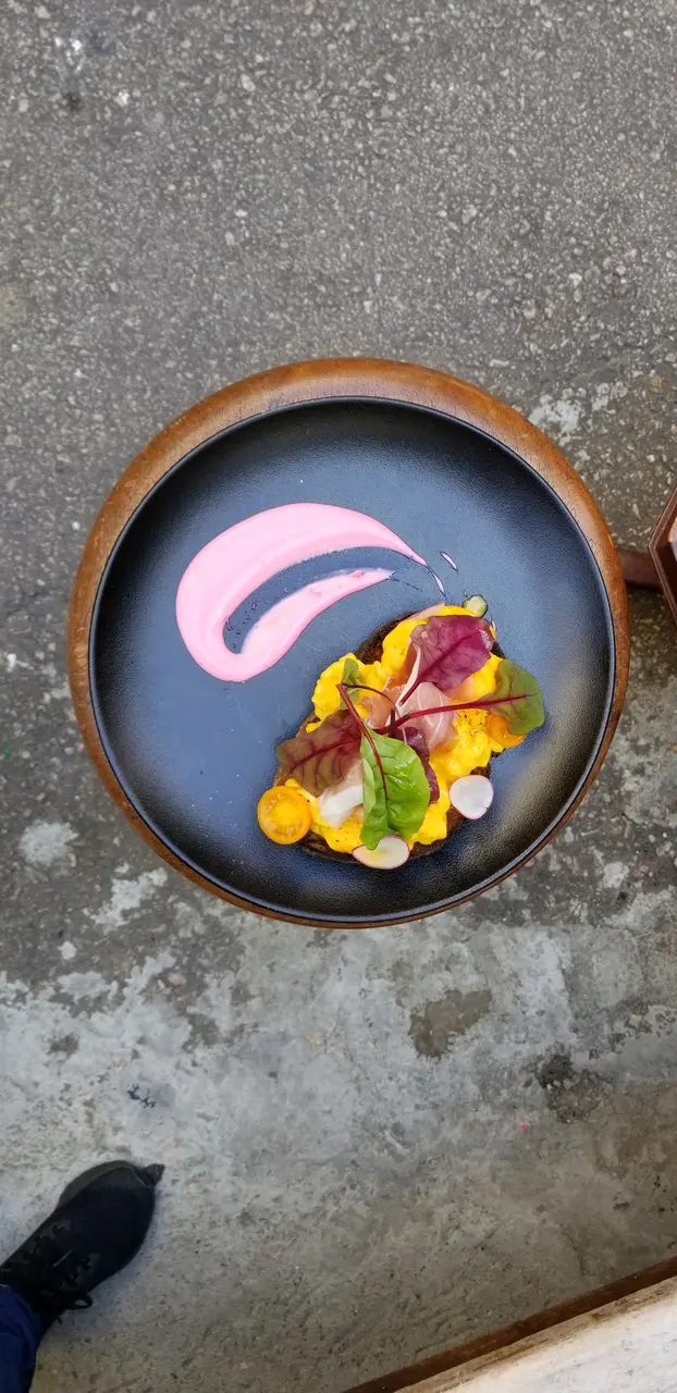 Scramble egg, parma ham on sourdough 