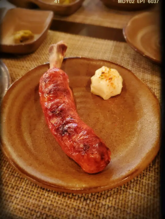 雞骨豬肉腸串（$18）