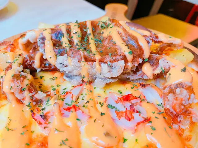 點解個個都叫軟殼蟹比薩架？