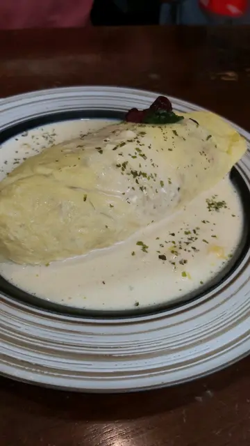 海膽蛋包飯配忌廉汁