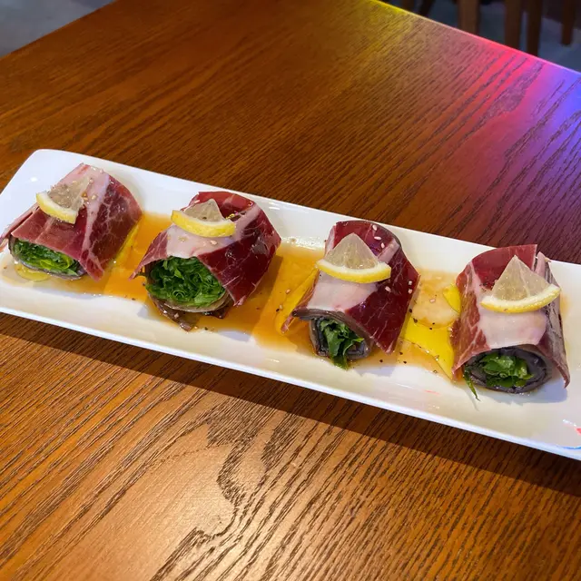 西班牙黑毛豬火腿及柚子蜜茄子卷配日本柚子醋汁