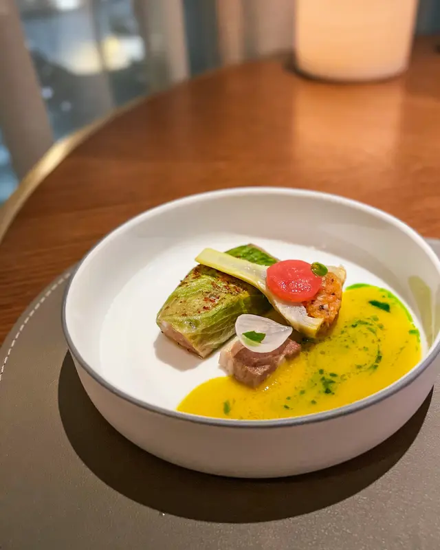 Duck Foie Gras° Purple Artichoke° Tomato° Carrot° Bacon° Onion° Espelette Chili° Basil°