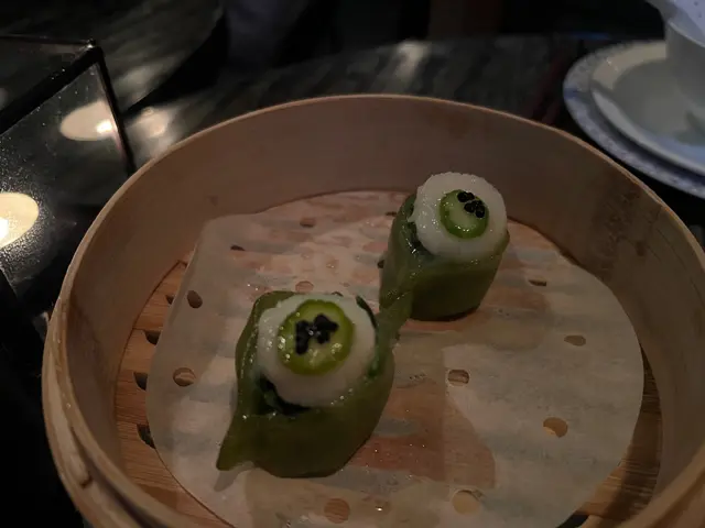 黑魚子翡翠帶子餃