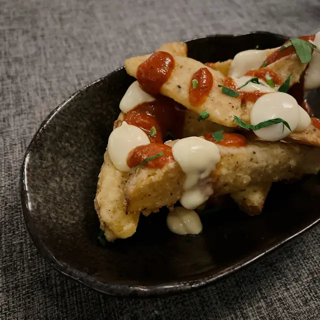 Oven  roasted  potatoes  w  spicy  sauce  