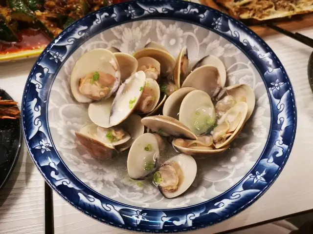 蒜香清酒烤焗活蜆