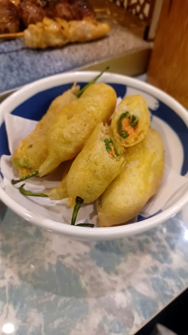 像酥炸皮內裡青椒仔釀了明太子，味道提升了不少。
