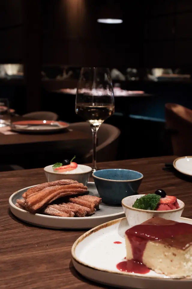 Churros w/ chocolate dip and vanilla ice cream  | Basque burnt cheesecake w/ mixed berries sorbet 