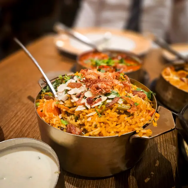 Veg Biryani served with Cucumber Raita