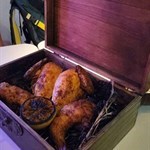 interesting presentation！at first I thought they were bringing me a box of cigars😂 this chicken came in a box with smoke. chicken is juicy & tasty 