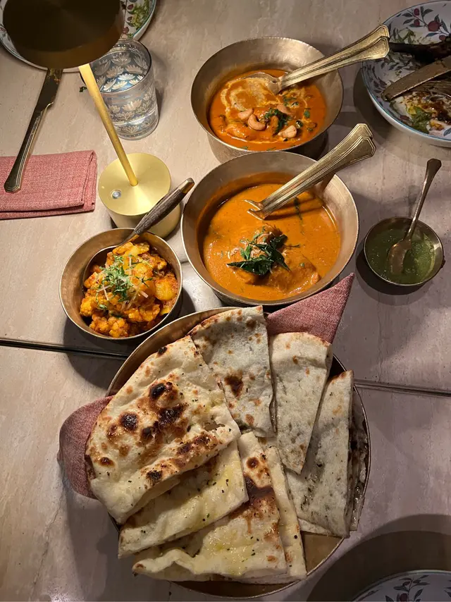 Garlic Naan, Black Truffle & Chili Cheese Naan, Malabar Fish Curry