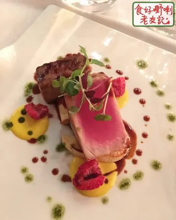 Seared  red  tuna,  pan  fried  foie  gras,  reduction  of  raspberry  vinegar,  organic  red  fruits