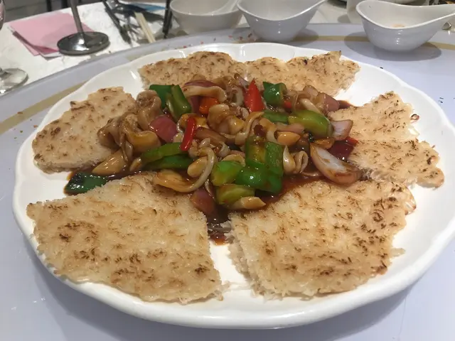 豉椒炒聖子皇 配煎米底