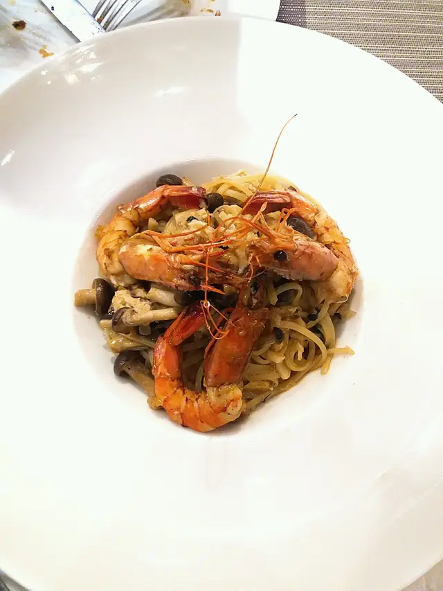 Butter Linguine with fresh crab mushroom, prawns, crab meat and white truffle oil