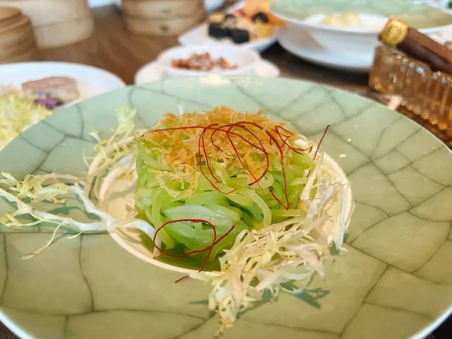 金瑤萵芛絲
