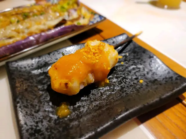 香蒜鹹蛋黃燒墨魚滑