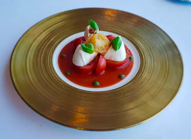 Appetizer - Burrata Cheese with Trio of Organic Sicilian Tomatoes, Anchovies and Fresh Italian Basil 