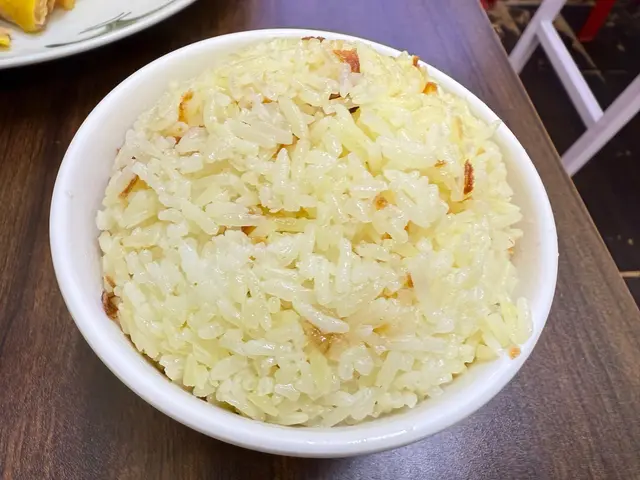 每人一碗雞湯油飯