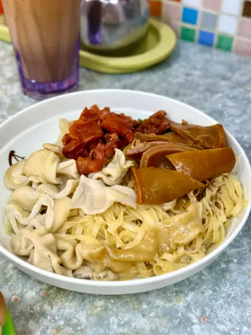 咖喱魷魚東風螺豬腸撈粗