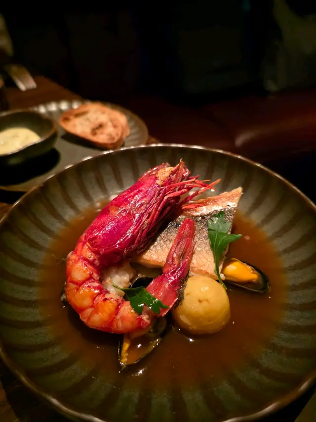 Seabass, Gamberi Rossi, Squid, Mussel in Bouillabaisse with new Potatoes, Aioli & Croutons