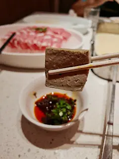 捞派黑豆花