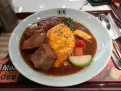 米青咖喱汁配厚切牛脷芯蛋包椰菜花飯