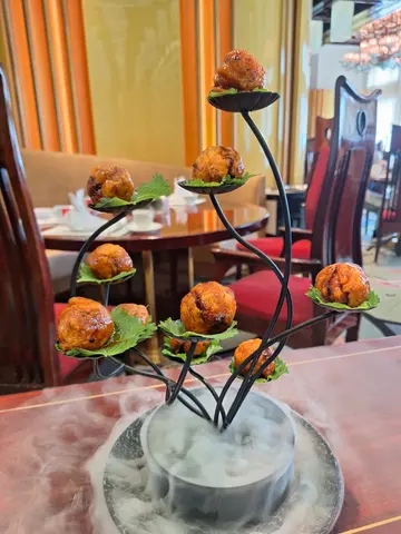 Deep Fried Pork stuffed in Lychee in Sweet and Sour Sauce