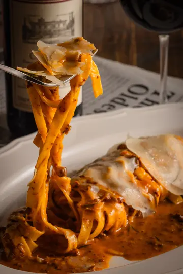 Handmade fettuccine, beef & pork ragout Bolognese, Parmesan cheese