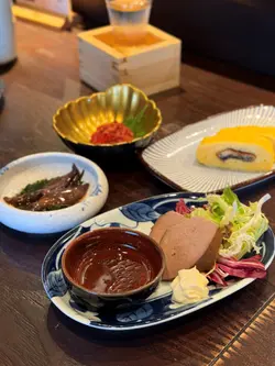 烟猪肝配胡麻盐